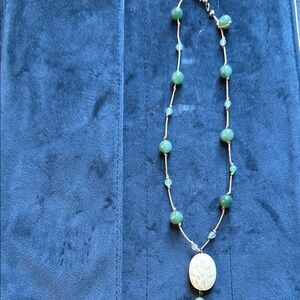 Elegant Green Beaded Necklace with jade pendant